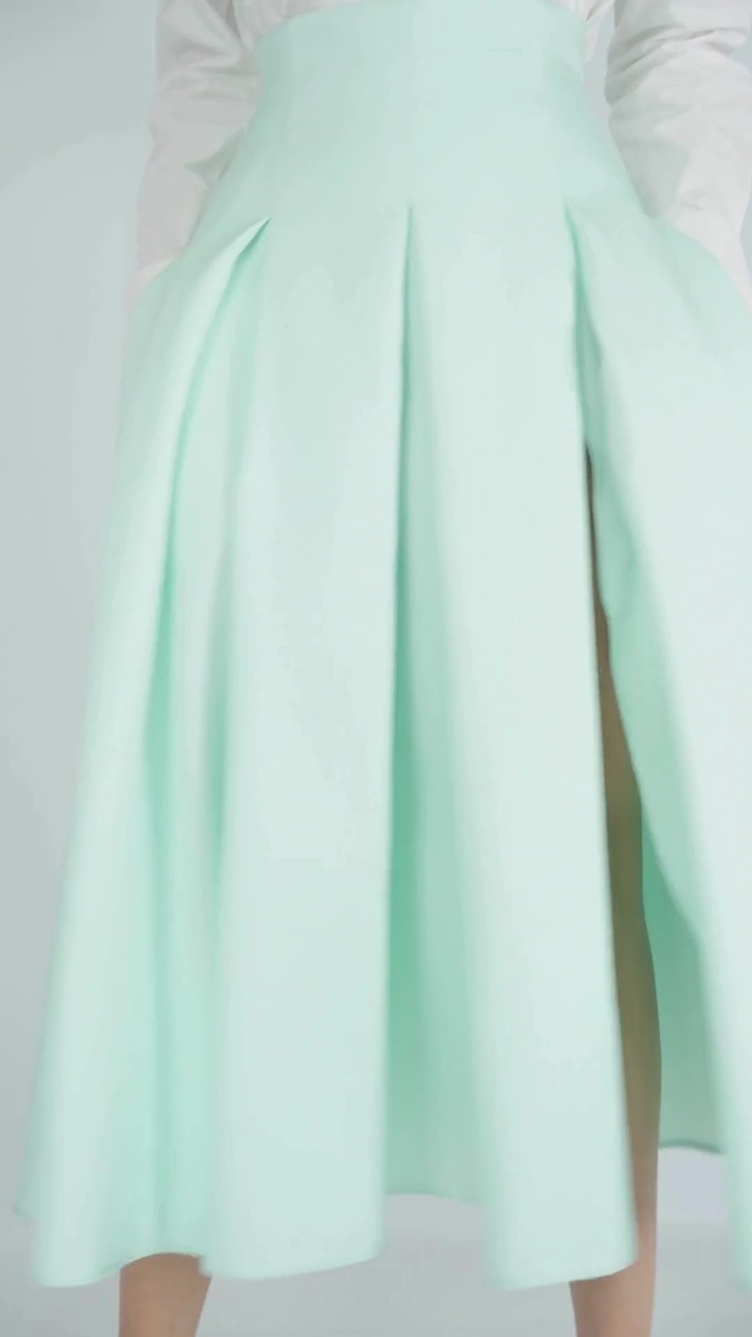 Satin pleated skirt with slit